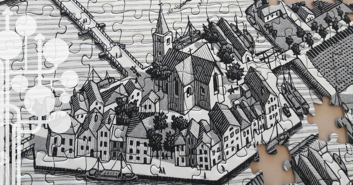 Fragment puzzla przedstawiającego rysunek czarno-białego miasta