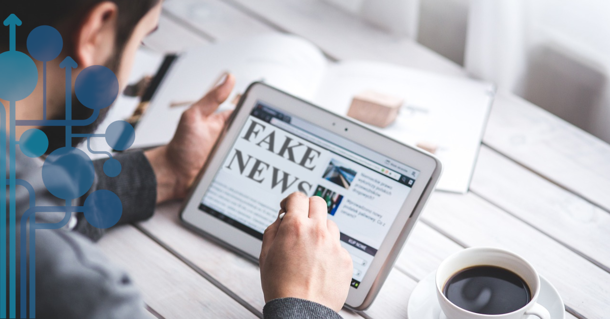 mężczyzna czytający newsy w tablecie