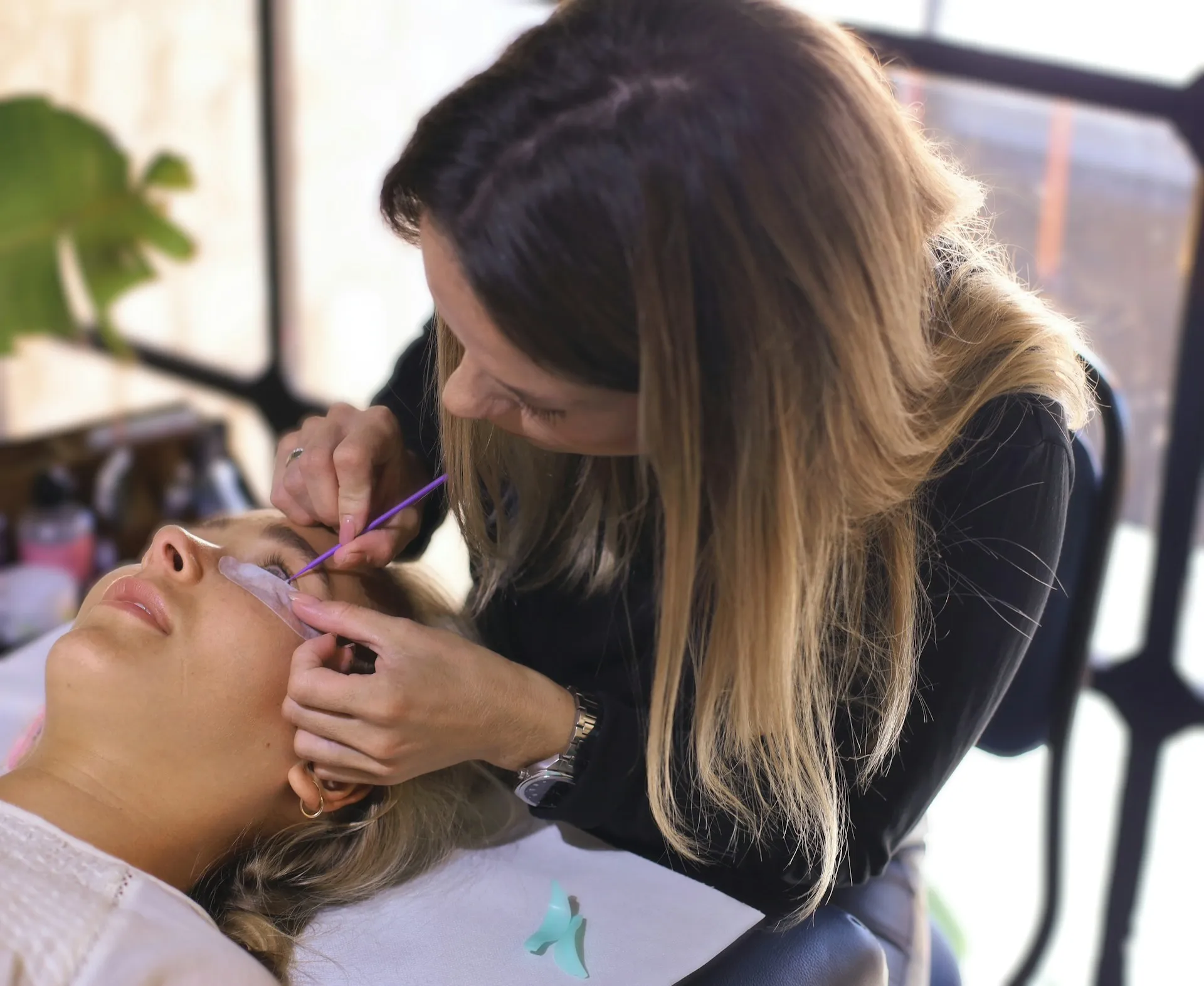 woman getting hair cut.
