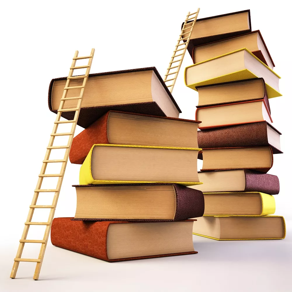A ladder leans against a stack of books, which has another ladder leading to the top of a taller ...