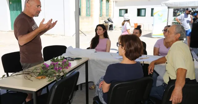 People listening to an training session.